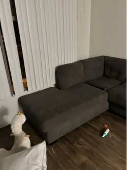 Dark gray sectional couch