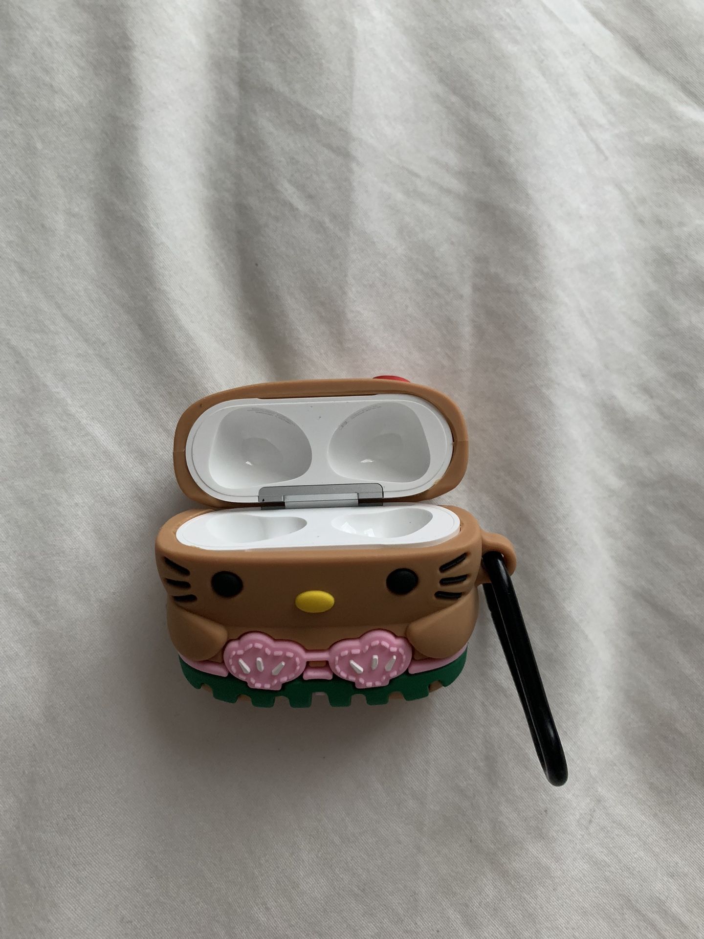 airpod charging case (no airpods ) + new hello kitty case + charger 