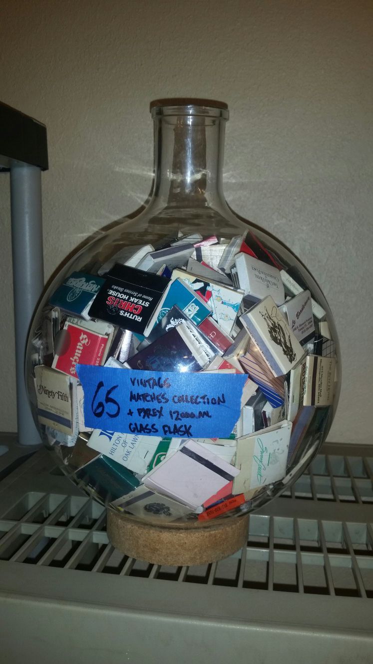Vintage matchbook collection in vintage glass pyrex flask