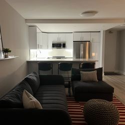 CB2 Charcoal Fabric Stitch Sofa and  Armless Chair