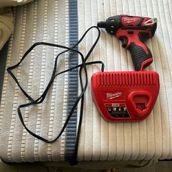 Milwaukee Drill And Battery Charger 