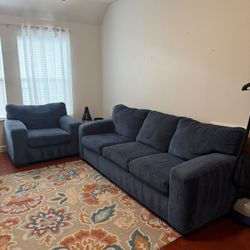 Rooms To Go Sofa, Chair And Rug