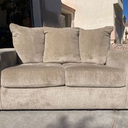 New Loveseat By Ashley 