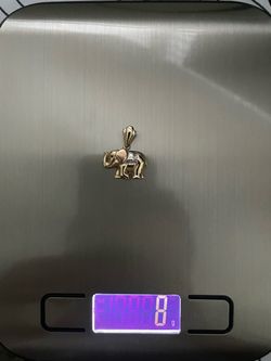 14k gold elephant pendant