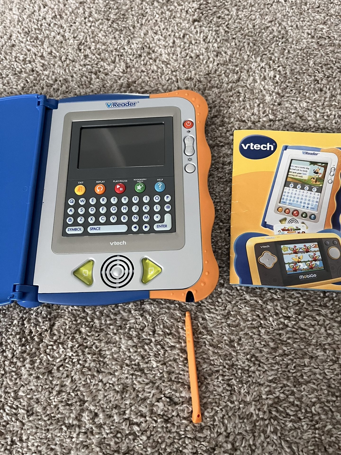 VTech VReader And 4 Cartridges: Cars, Dora, Toy Story