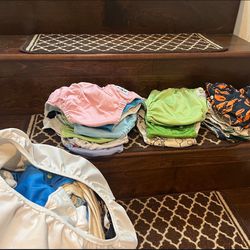 Assorted Cloth Diapers, Inserts, and Wet Bag