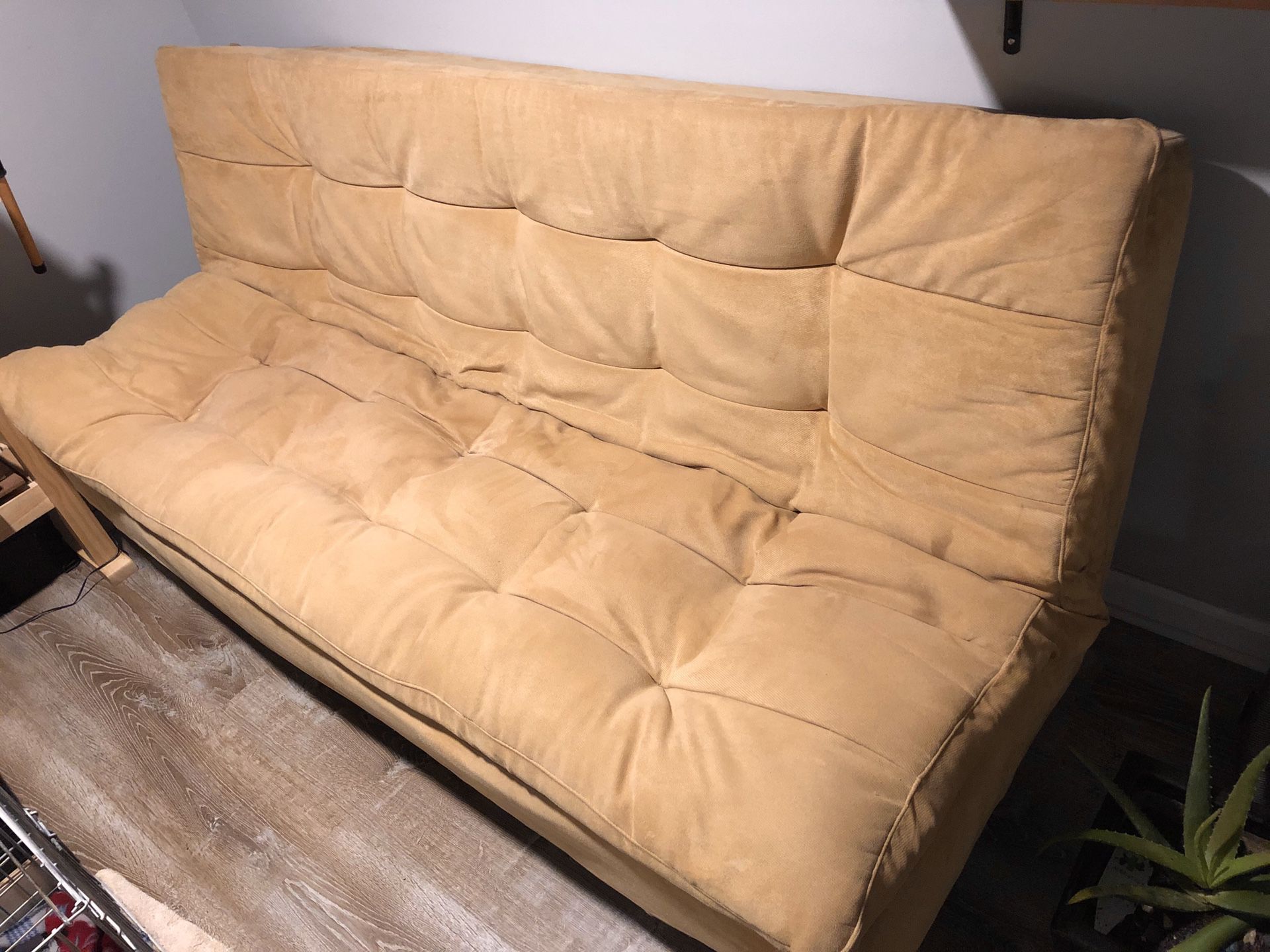 Golden Futon sofa