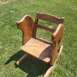 Rare hand carved child’s chair 