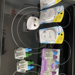 Febreeze Plug Ins And Refills/Ozium Spray