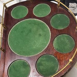 vintage mahogany wood drink serving tray with green felt-lined compartments and a brass railing.