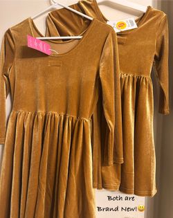 Both Dresses are new! Size 14 & 7 Price $1 And Up!