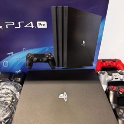 Ps4 1TB w/ 4 controllers and charging stand
