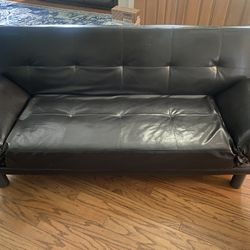 black leather sleeper couch