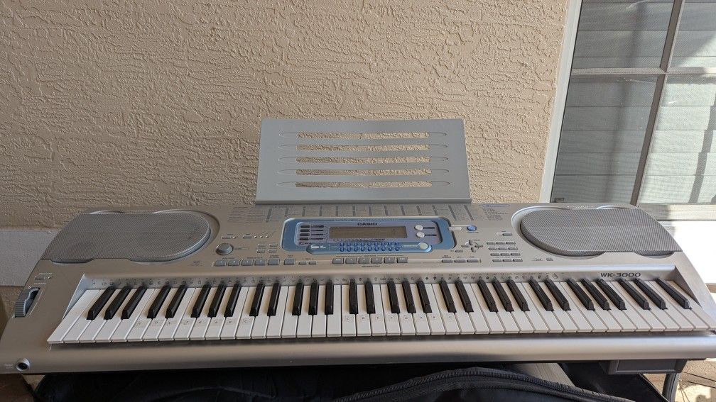 Casio WK-3000 Keyboard And Collapsible Stand