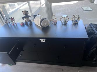 Black Dresser with Multiple Drawers