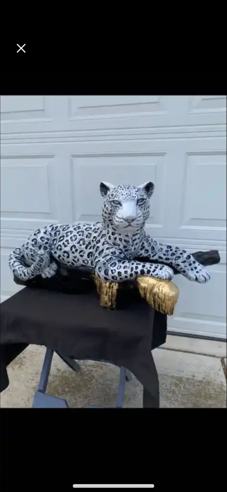Snow Leopard On The Log Statue