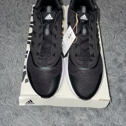 Size 11, men’s brand new unworn Adidas shoes with tags and box