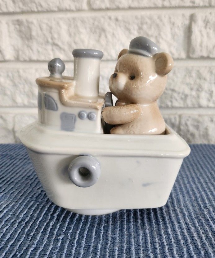 ArtMark Porcelain Music Box a teddy bear in a tugboat.