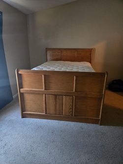 California king bed with captain bed frame.