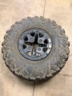 Carnivore ATV/UTV Tire and Beadlock Wheel with tire rack holder