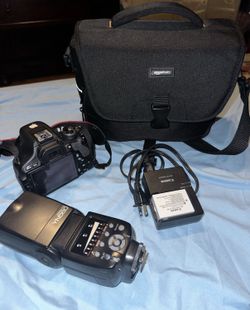 Canon T3i + 50mm Lens +flash + Camera Bag