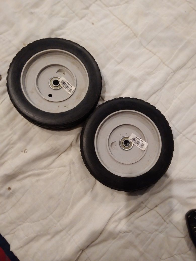 NEW. 8 INCH. MOWER WHEELS DOUBLE BEARRINGS NYLON WHEEL HUBS 15 EACH OR 25 FOR BOTH