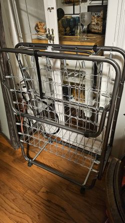 PORTABLE TWIN BED FRAME on wheels