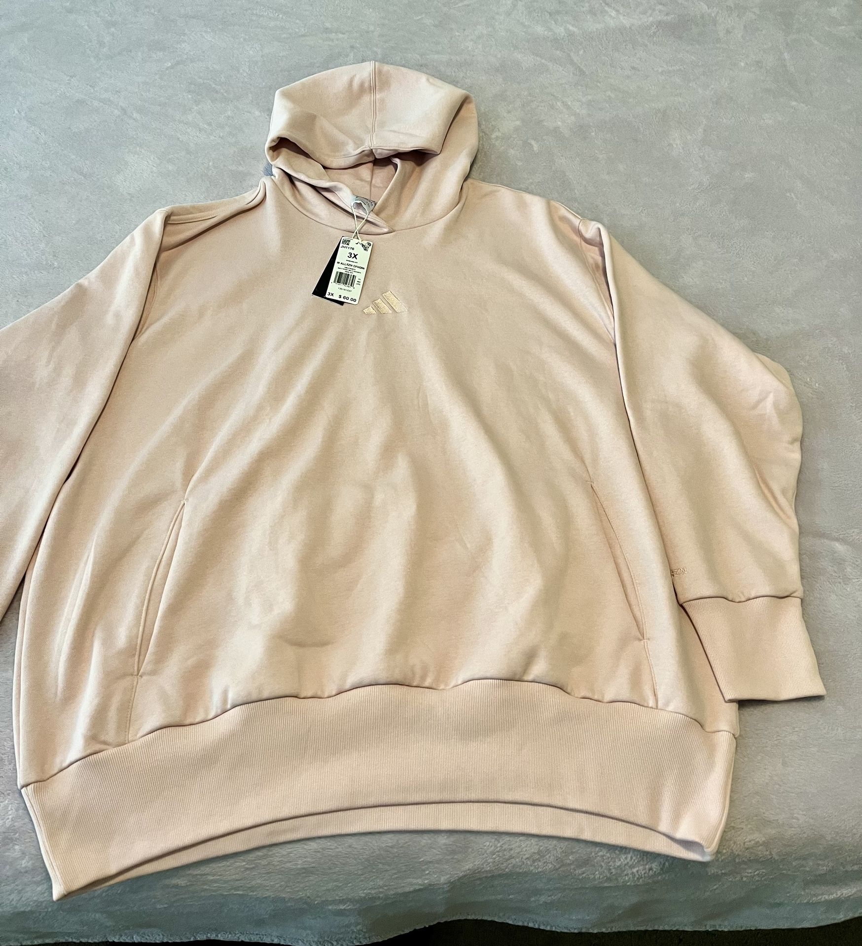 Adidas cozy hoodie, size 3X color, sandy pink new with tags. Retailed for $60.  As is. No returns. Make me an offer I can’t refuse. Please feel free t