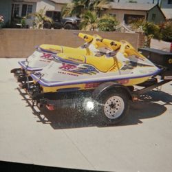 Two !  1995 SeaDoos Xp with double trailer.