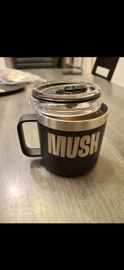 black YETI Rambler 14 oz Mug featuring a prominent "MUSH" logo By Ikea