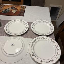  Set of four Pier 1 "Holiday Scroll" 10-inch plates