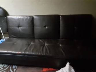 Leather futon with storage bin