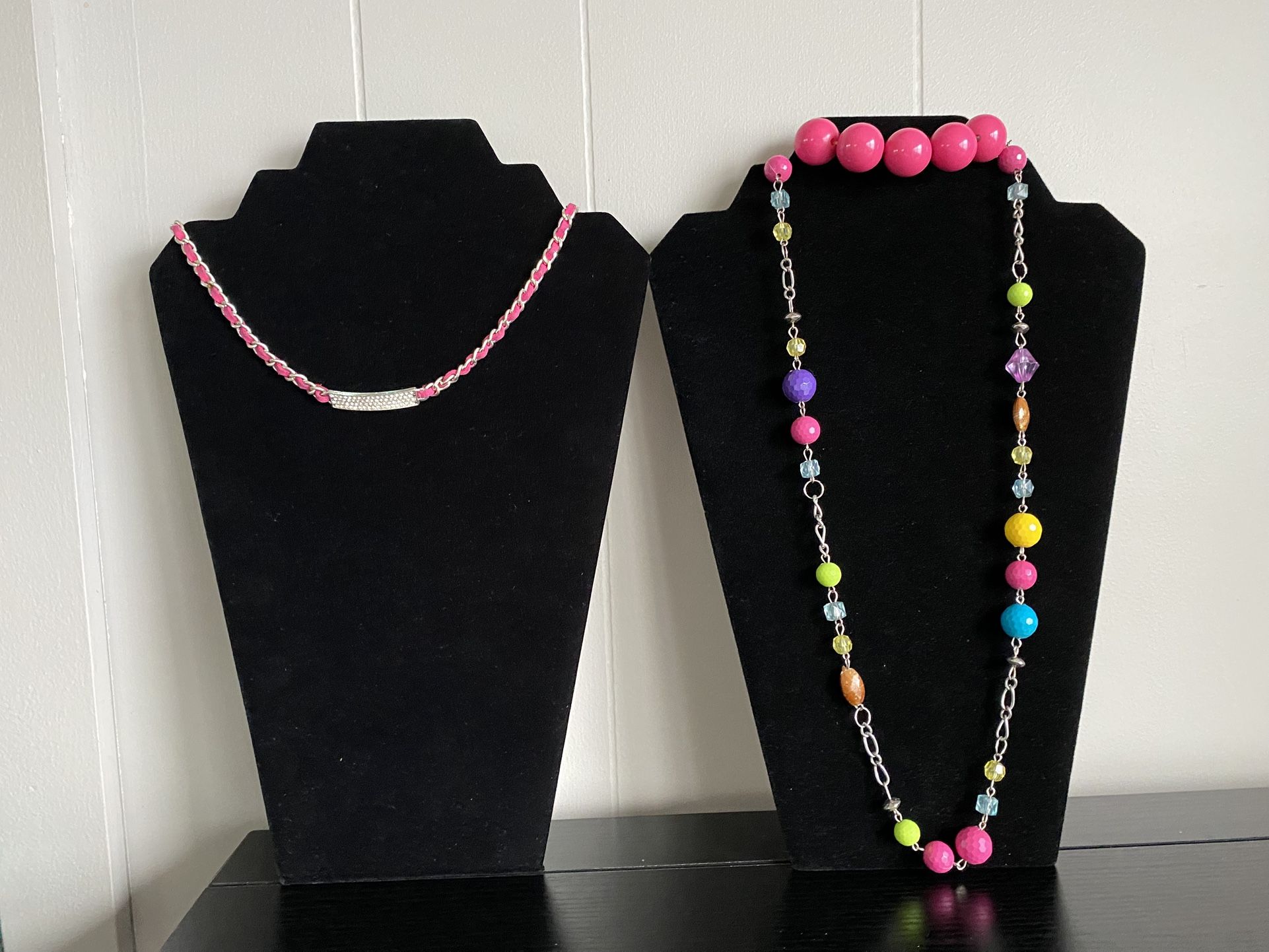 2 Pink Necklaces And One Pink Bracelet