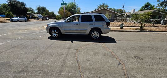 Pongo ala venta  mi jeep  gran cheroke overland 4x4  título limpio, con solo 142mil millas smog  en mano