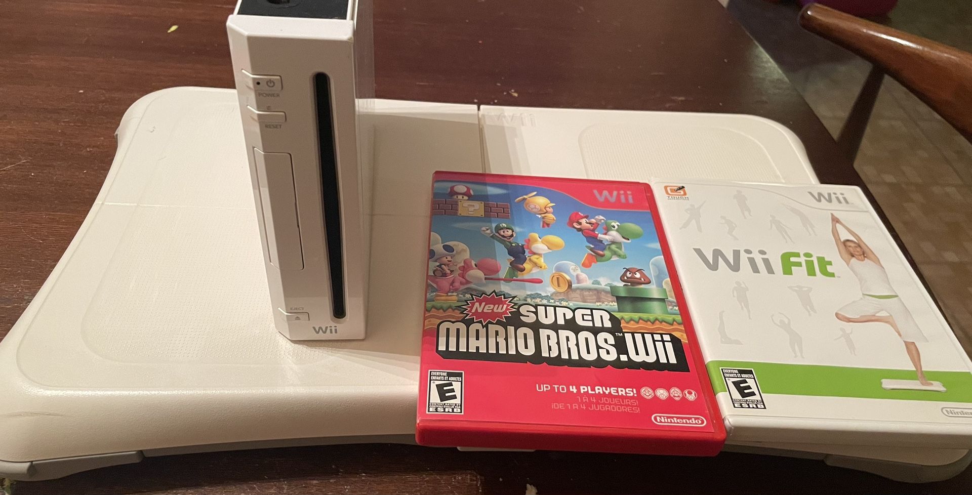 Nintendo Wii, Wii Fit Board, 2 games, & 2 controllers