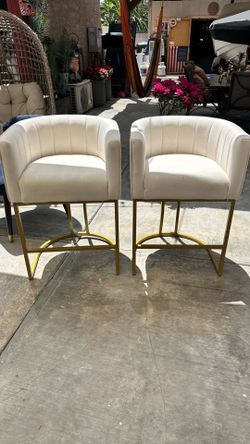 Chairs with gold accent