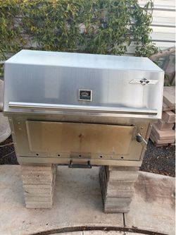 Asador de leña para  adaptarse en  cosina exterior