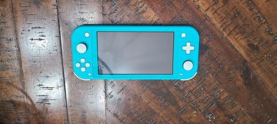Nintendo Switch Lite(Teal) And Animal Crossing Game
