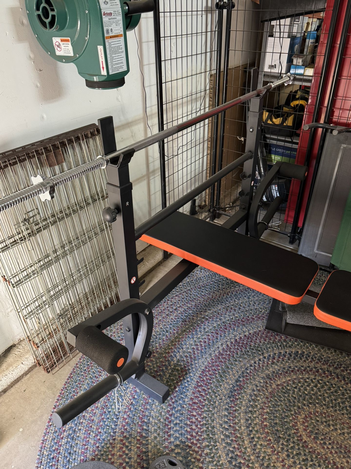 Weight Bench with Barbell and Plates