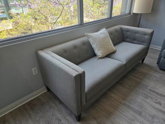 Gray Tufted Fabric Sofa with Dark Legs