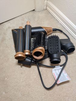 Hair dryer with accessories for combing and blowout