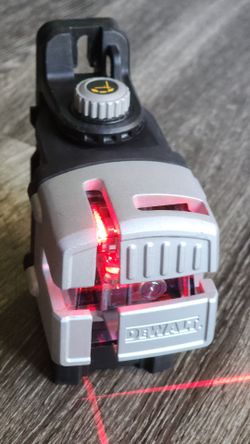 DW089k self leveling 3 beam line laser.  Red laser, Black , Dewalt