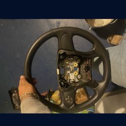 got this steering wheel and cluster up for grabs , off a 2014 silverado 