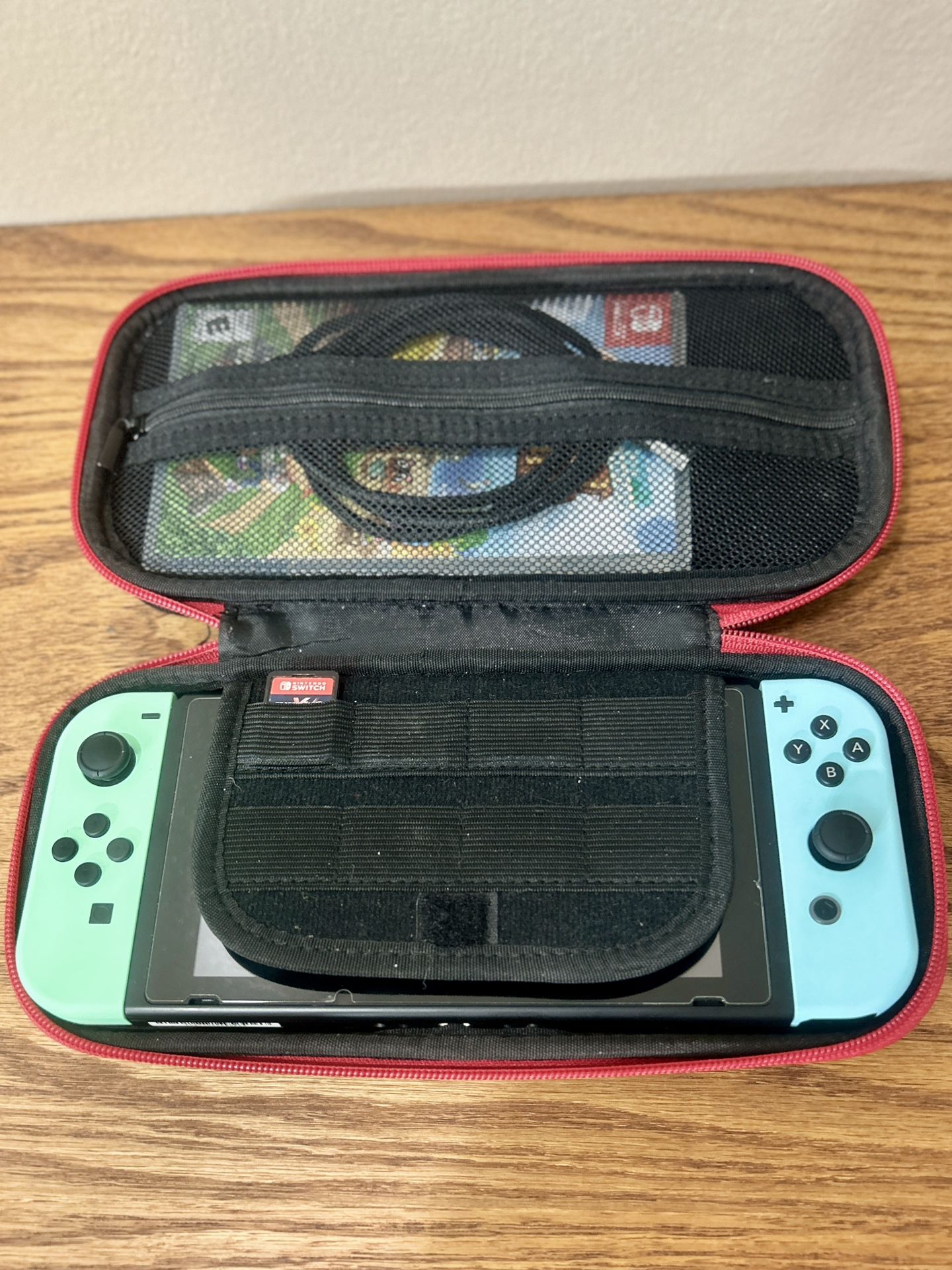 Nintendo Switch OLED Animal Crossing Edition 64 GB + 3 Games + Case + Charger