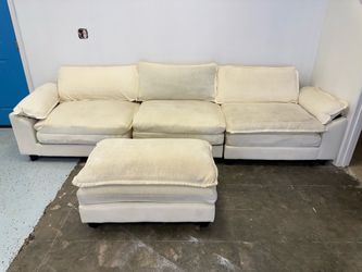 Modular cloud style sectional sofa with ottoman