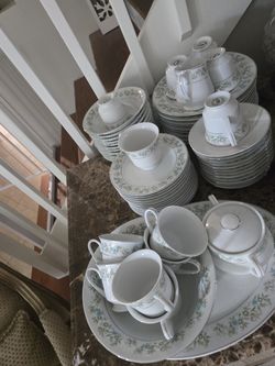 Nice China sets of 12 servings including tea, milk, platter, bowl etc