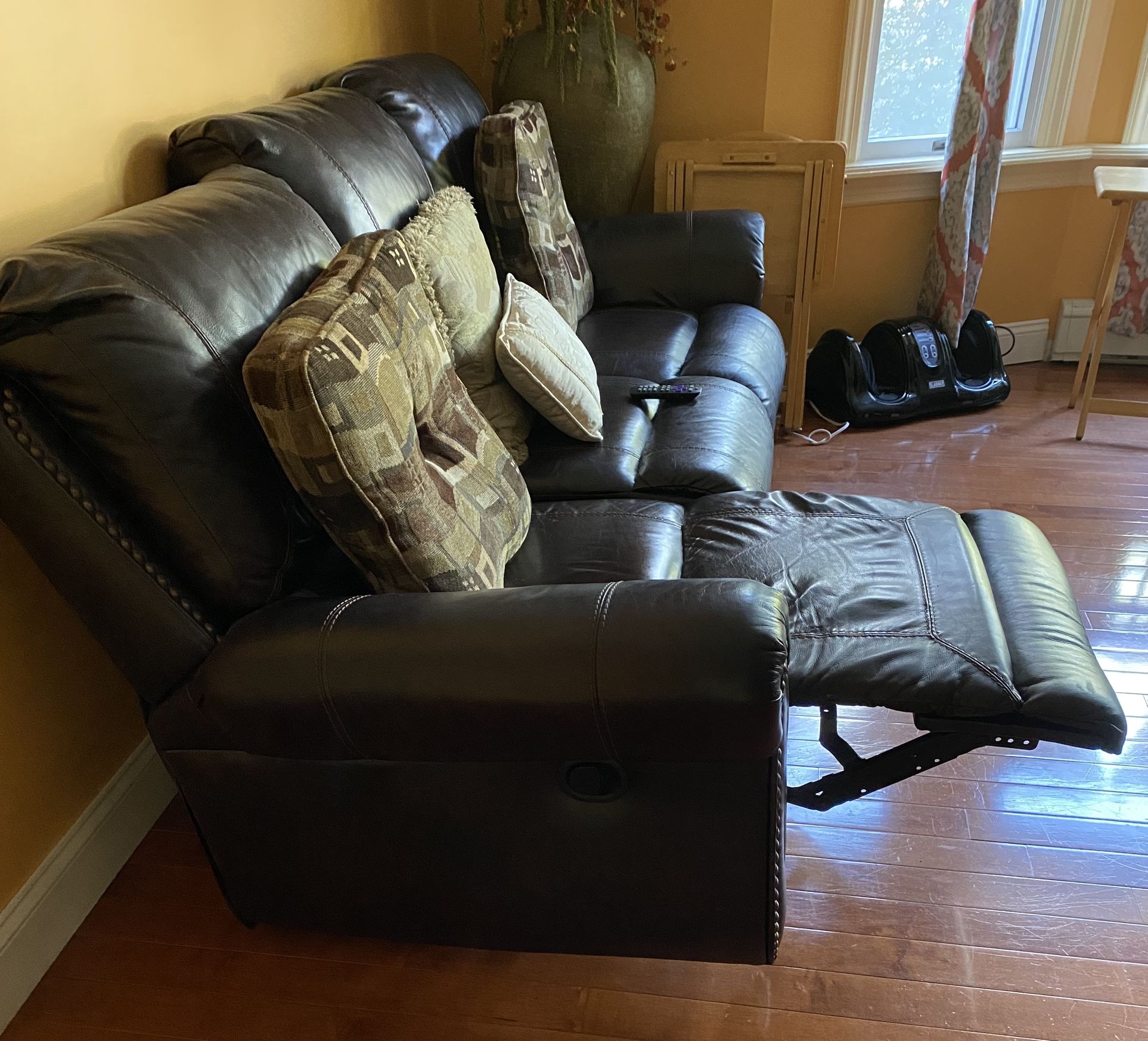 Leather recliner with nailheads