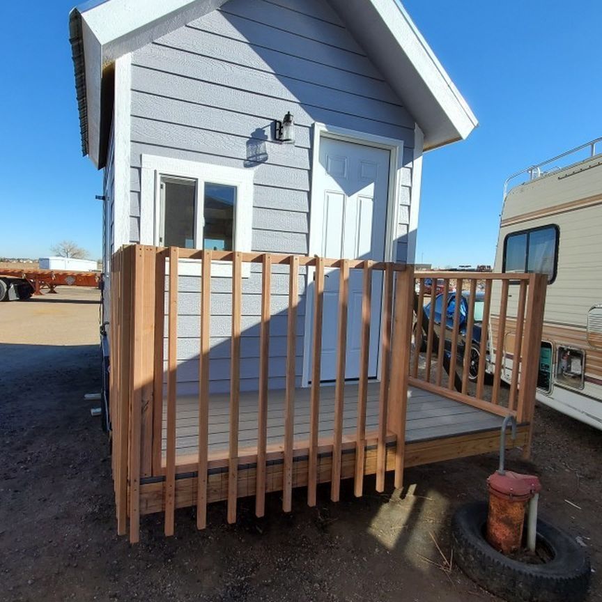 Tiny Home 20 Foot Trailer With Extended Porch And Awning.