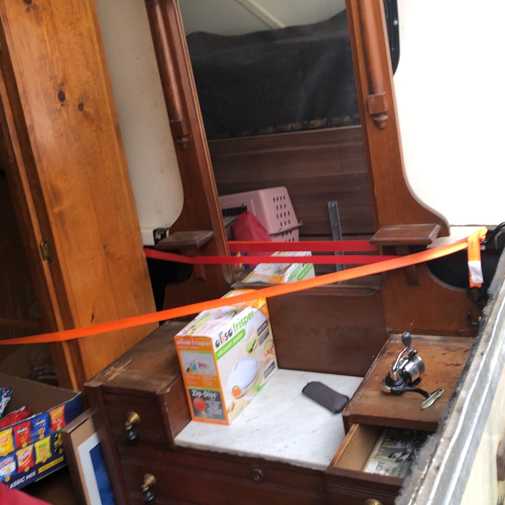 Antique dresser with three ivory tops to go with it $200