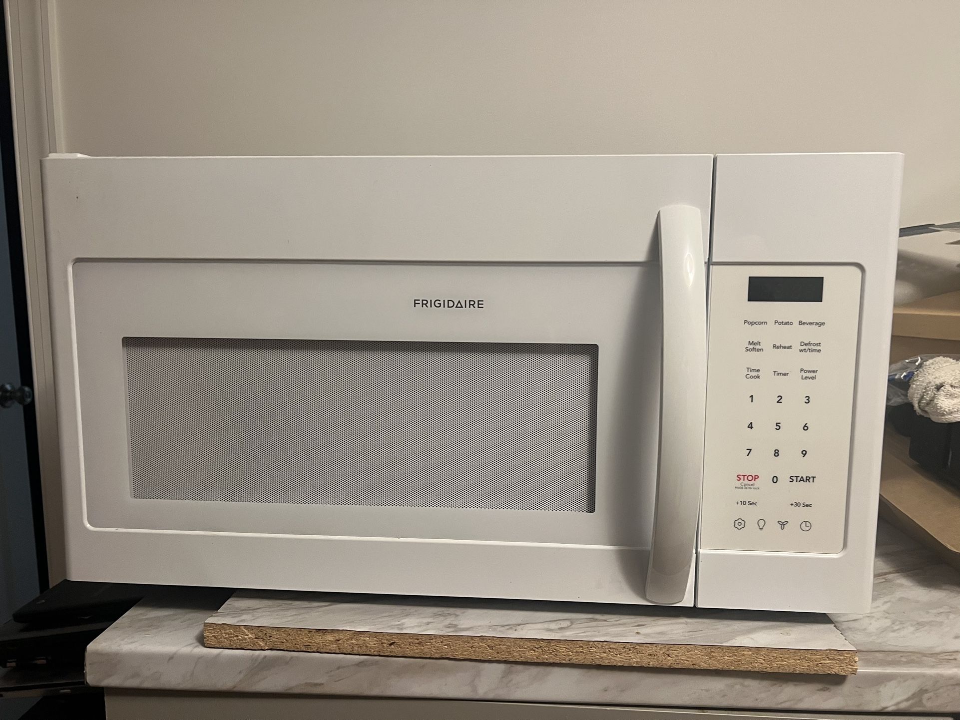 White Frigidaire Microwave Over The Range